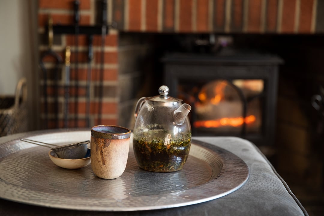 Tea + fireplace